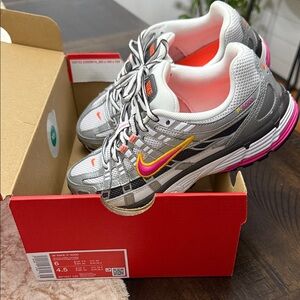 Nike Women's Silver Athletic Sneakers with Pink & Yellow Swoosh